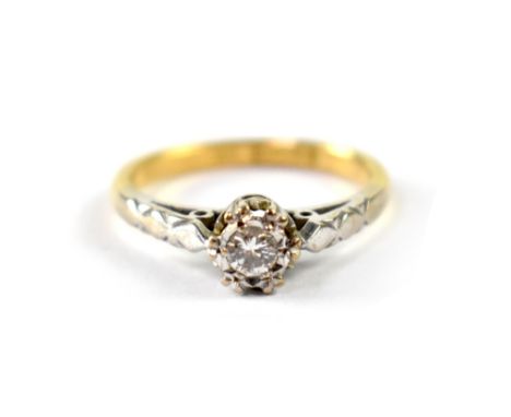 An 18ct gold diamond solitaire ring, hallmarked 18ct gold with single set diamond approx 0.1ct, size K, approx 2.9g.