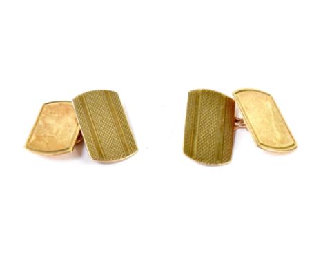 A pair of gentlemen's 9ct gold cufflinks with engine turned decoration, approx 3.1g.