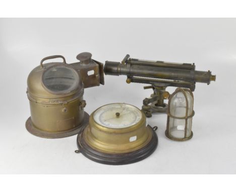 A brass-cased ship's binnacle compass/oil lamp, with applied brass plaque 'Patt 0183', height 26cm, a further plastic compass