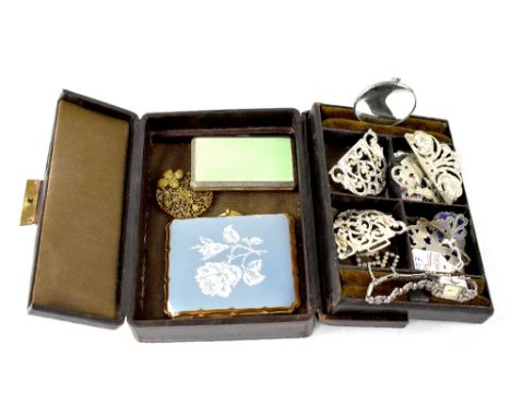 A small jewellery box containing enamelled cigarette case, a compact, four sets of buckles, a silver nursing award, a ladies'