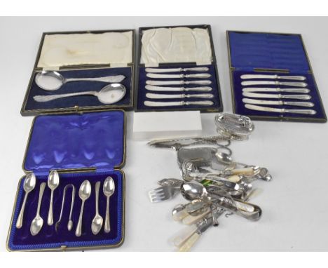 Various silver plated items to include four cased cutlery sets, a cased bread knife, expanding beaker, napkin rings, grape sc