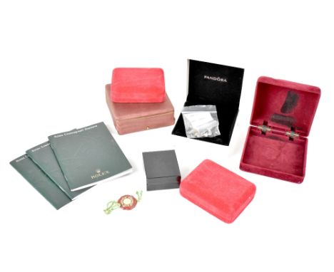 A quantity of watch and jewellery boxes to include Pandora, also Rolex Daytona booklets, watch buckles to include Longines an