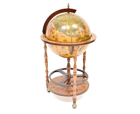 A cocktail cabinet in the form of a globe, with fitted interior, revolving section above undershelf, height approx 95cm (af).