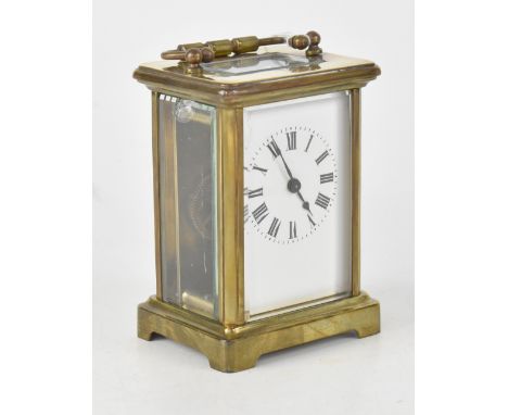 An early 20th century French brass carriage clock, the white dial set with Roman numerals, height 11cm. CONDITION REPORT Not 