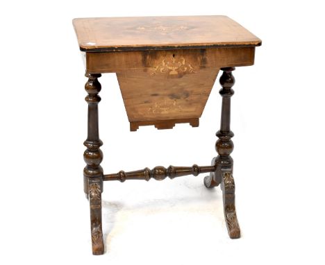 A Victorian inlaid walnut sewing table with original card partitions and silk-covered storage boxes, containing a quantity of