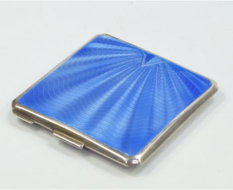 A George V silver powder compact by Mappin & Webb, with a mid blue guilloche enamel lid, mirror to cover, Birmingham assay.