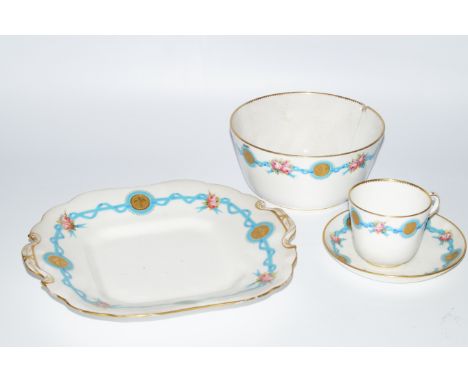 A late 19thC semi-porcelain part tea service, polychrome decorated and gilt highlighted with upper floral garlands predominan