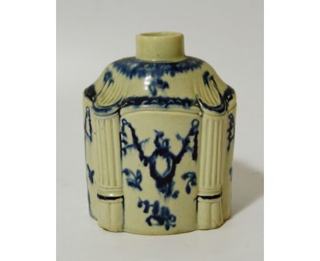An 18thC pottery blue and white tea caddy, the shaped body with plain cylindrical top in a Neo-Classical design, with stylise