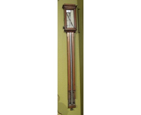 A 20thC oak cased stick barometer.