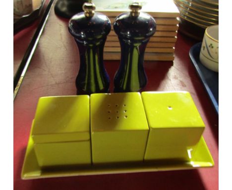 Two 1960's Unicorn retro plastic salt and pepper mills, and a Carltonware cubist cruet. (3)