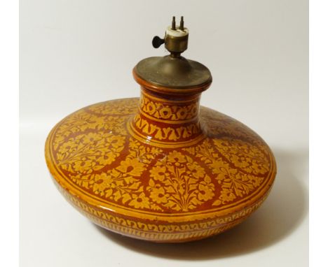 A Victorian slip glazed earthenware lamp base, 40cm dia.