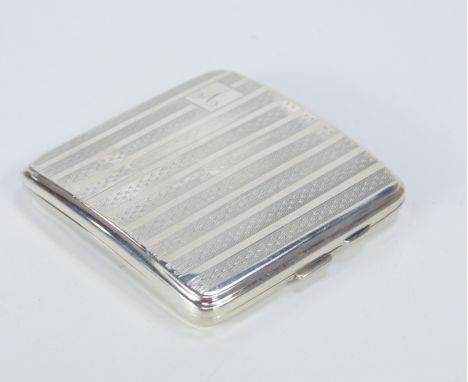 A George V engine turned silver cigarette case, bearing the initials A, Birmingham 1927 by Walker & Hall, 4oz.