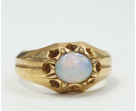 A gentleman's signet ring, set with an opal, marked 18C, 7.7g all in.