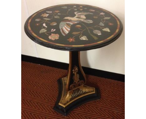 A parcel gilt and ebonised pedestal table, with pietra dura specimen marble top depicting a bird, 60am dia.