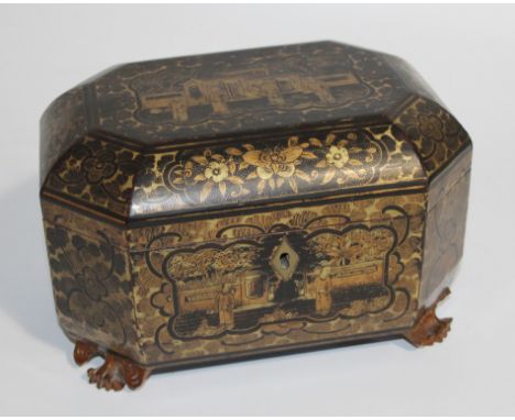 A Regency black lacquer and chinoiserie tea caddy, Chinese export with two pewter caddy inserts and carved paw feet, 24cm wid