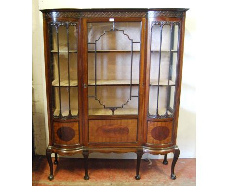 Art Nouveau mahogany display cabinet in the manner of Thomas Chippendale, the geometric frieze above an astragal glazed door 