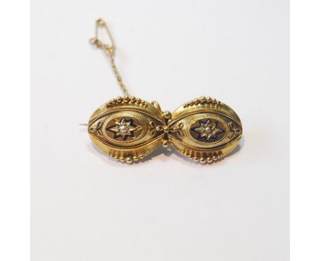 Victorian gold brooch, formerly a pair of drop earrings, ovals with enamelled pearl-set star. 