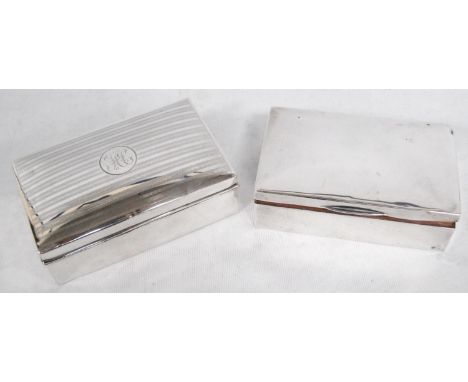 Two silver cigarette boxes, one with engine turned cover.&nbsp; (2) 