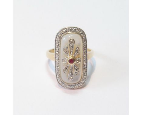 Finger ring with a ruby and diamonds upon pearl, in gold, '18k', 9.4g gross, size O. 