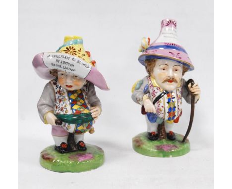 Pair of early 20th century Royal Crown Derby Mansion House dwarf figures, both bearing slogans to their hats, 'Theatre Royal 