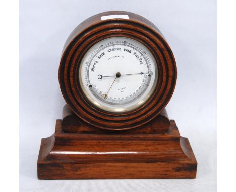 Victorian barometer, stamped John Browning, London, approximately 12.5cm diameter, enclosed in a mahogany drum-shaped mantel 