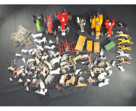 Diecast - Dinnky, Britains and other - eleven unboxed diecast tractors and trailers, also included in the lot are in excess o