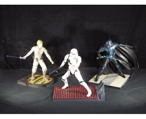 Star Wars - Three 12 inch Star Wars figures. Stormtrooper is made by Kotobukiya and the two others could be attributed to the