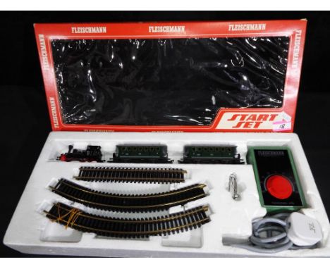 Fleischmann Start Set # 6325 comprising Tank locomotive, two passenger carriages, twin rail track and power controller 6730, 