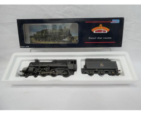 Bachmann Branch Line - an OO gauge 4-6-0 locomotive and tender, Standard 4MT class, op no 75065 BR black livery, weathered fi