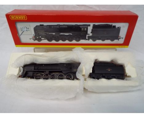 Hornby - an OO scale model 2-10-0 class 9F locomotive and tender, op no 92239, Super detail, black BR livery, weathered finis