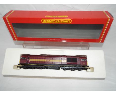 Hornby - an OO scale model Co-Co diesel electric class 58 locomotive, op no 58039, EWS  # R 2125B, appears mint in red window