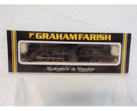 Graham Farish - an N gauge model locomotive and tender, 4-6-0 op no 6960 'Raveningham Hall', GWR green livery # 1404, appears