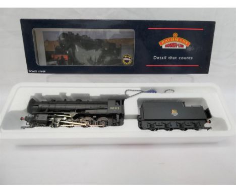 Bachmann Branch Line - an OO gauge 2-8-0 locomotive and tender WD Austerity class, op no 90312 BR black livery # 32-253, appe