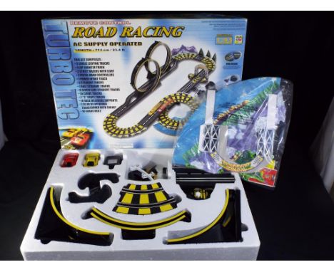 Turbo Tec - A Turbo Tec Road  Racing model slot car set. Item is boxed and appears to be in playworn condition with nominal s