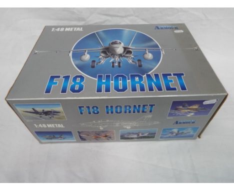 Franklin Mint Armour Collection - No.98014  A boxed diecast 1:48 scale F-18 HORNET - US NAVY. The model appears to be in Mint