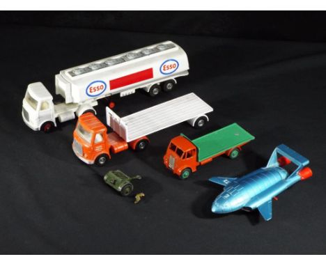 Diecast - Dinky Toys - four unboxed diecast vehicles and accessories by Dinky Toys, including AEC Esso Tanker, AEC Arctic Tra