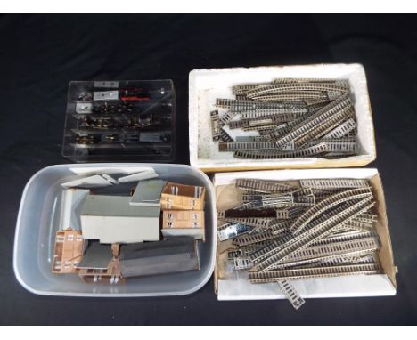 Fleischmann - N gauge track, some scenics, Two motorised chassis's and similar all unboxed and in Playworn Condition. 