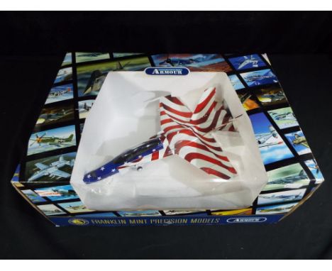 Franklin Mint Armour Collection - No.B11E759. A boxed diecast 1:48 scale F18D HORNET - STARS &amp; STRIPES. The model appears