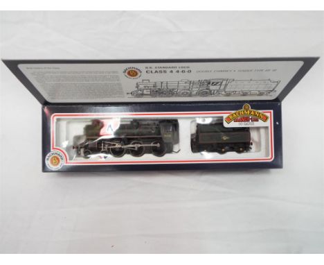 Bachmann - an OO scale model locomotive 4-6-0 Class 4 standard loco, op no 75023, double chimney, green BR livery, # 31-101, 