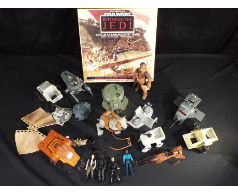 Kenner, Hasbro, Parker and others - A collection of vintage Star Wars action figures, vehicles, and a boxed Parker Brothers '