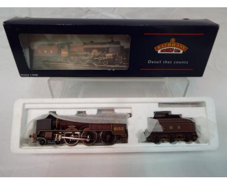 Bachmann - an OO scale model locomotive 4-6-0 P/Boiler Scot Class op no 6155 'The Lancer', LMS crimson livery, # 31-281, with