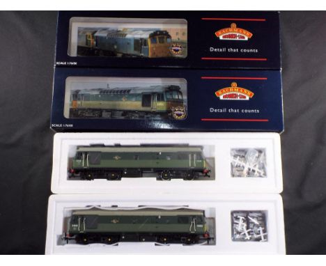 Model Railways - Bachmann OO gauge - two Class 25 diesels in BR green comprising 32-400 and 32-411, locos appear to be in ver