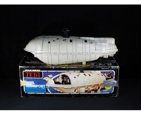 Palitoy - A boxed Palitoy Star Wars Return of the Jedi Rebel Transport Vehicle. The item is in playworn condition and is inco