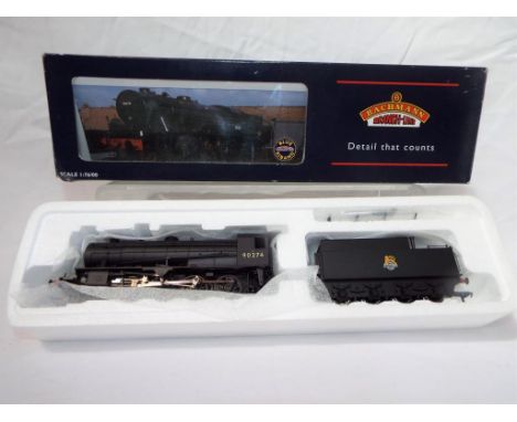 Bachmann - an OO scale model locomotive 2-8-0 WD Austerity Class op no 90274, with tender, BR black livery, # 32-251, appears