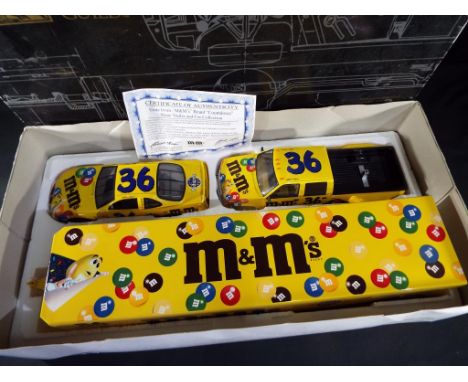 A Ernie Irvan NASCAR M&amp;M's show trailer and car collection by Brookfield Collectors Guild,1:24 scale Pontiac Race Car, GM