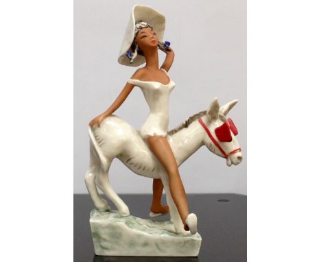 A RARE W. GOEBEL WOMAN ON BEACH DONKEY DATED 1956 BY A. MULLER MODEL G.F. 122, 22CM 