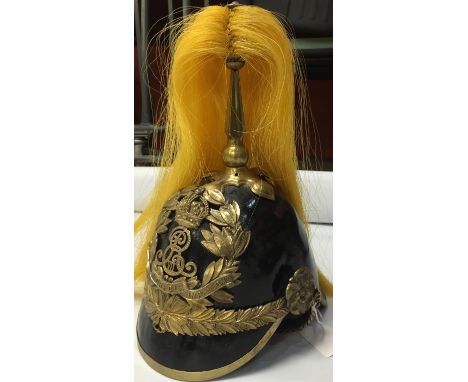 KINGS OWN NORFOLK IMPERIAL YEOMANRY HELMET, LEATHER HELMET BRASS FITTINGS AND YELLOW PLUME IN ASSOCIATED TIN 
