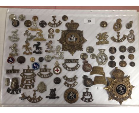 COLLECTION OF KENT RELATED MILITARY BADGES INCLUDING VICTORIAN WEST KENT HELMET PLATE AND THE ROYAL WEST KENT REGIMENT HELMET