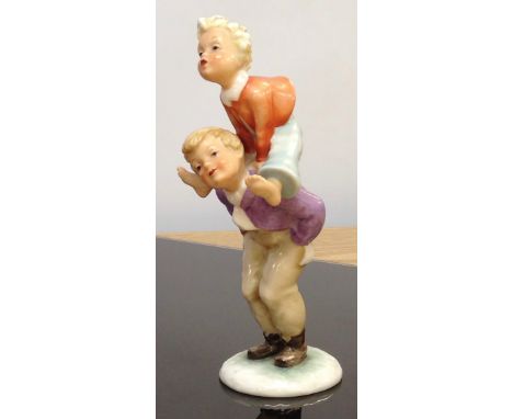 W. GOEBEL "CHILDREN PLAYING LEAP FROG" DATED 1958 MODEL D.A4 18CM 