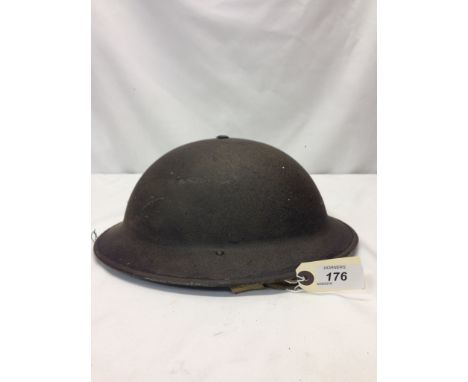 BRITISH WWII HELMET, GAS MASK IN CANVAS CASE AND STIRRUP PUMP